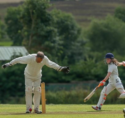 old versus old at village cricket lifestyle image of old versus young playing village cricket at blakesley village cricket field on a hot summer day